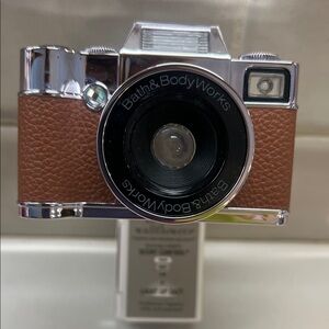 Bath & Body Works Wall Plug in  Silver and Brown Simulated Camera